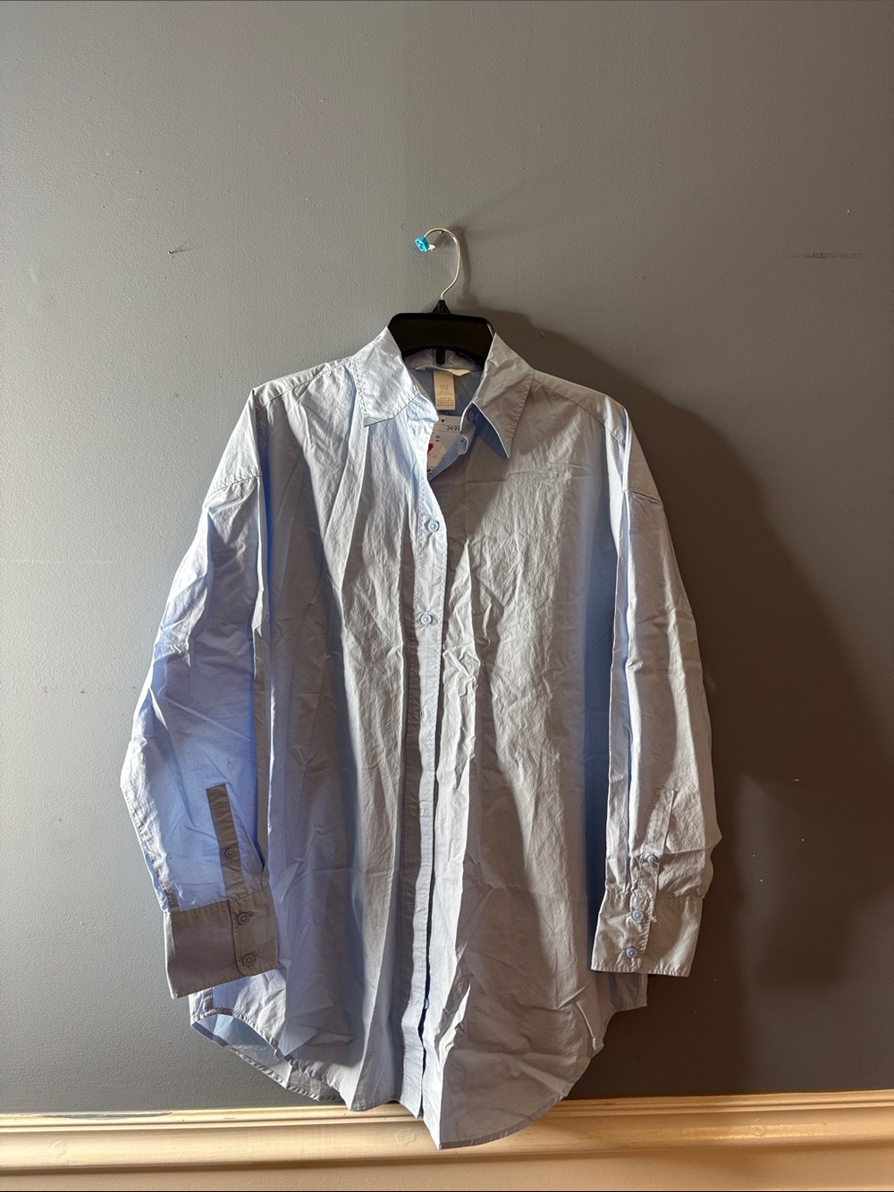 H&M Button Up Shirt in blue with collared neckline roll tab sleeves size XS NWT